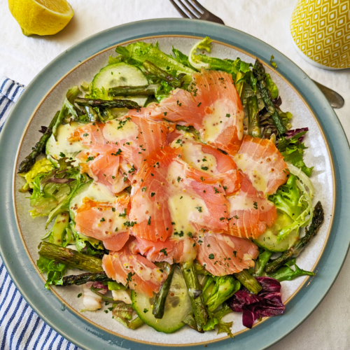 Smoked salmon and asparagus salad with a a honey and mustard dressing.